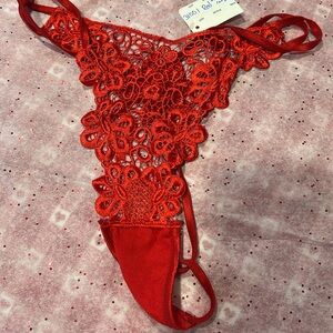 NWT size med,large lace thongs panties. Red, gorgeous and super sexy